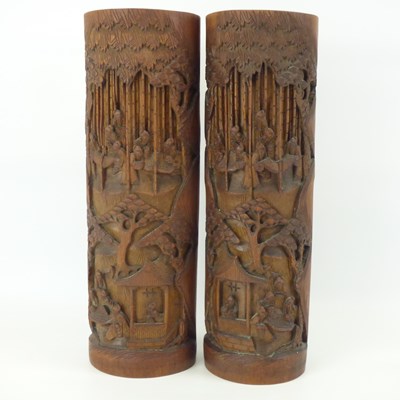 Lot 424 - A pair of 20th century carved bamboo brush pots