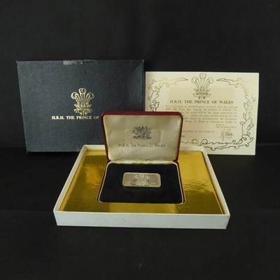 Lot 665 - A hallmarked silver .999 grade 100g silver bar bearing the emblem of HRH Prince of Wales