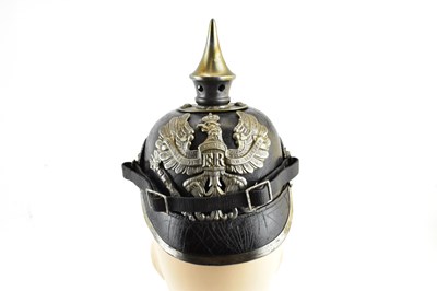 Lot 573 - A 1914 Prussian pickelhaube helmet.
