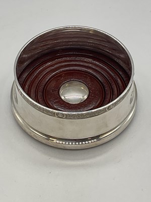 Lot 1092 - An Elizabeth II hallmarked silver and wooden...