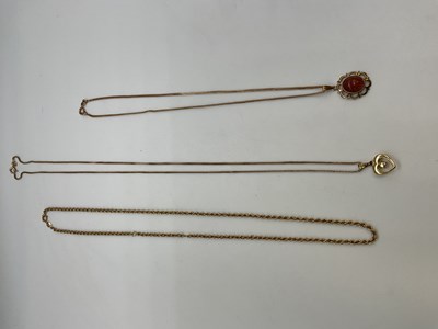 Lot 1201 - Three 9ct yellow gold chains with associated...