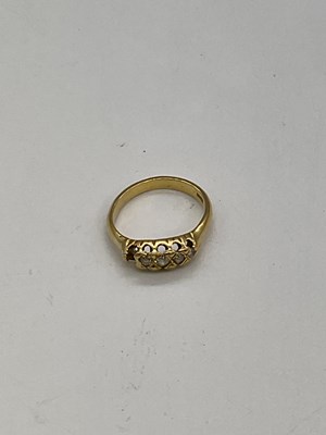 Lot 1266 - An 18ct yellow gold and diamond ring set with...