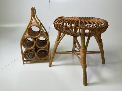 Lot 480 - FRANCO ALBINI; a circular wicker stool raised...