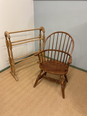 Lot 449 - A child's Windsor armchair and a pine towel rail.