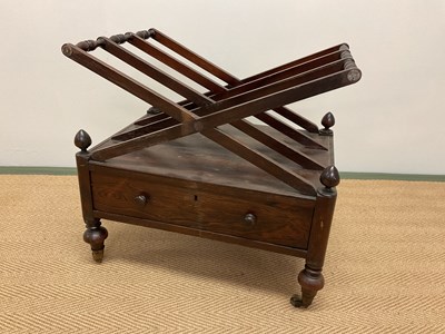 Lot 434 - A rosewood Canterbury with a single drawer to...