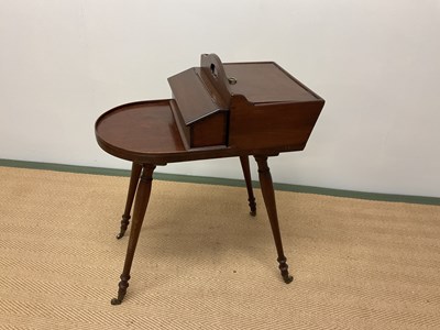 Lot 504 - A mahogany sewing/occasional table with twin...