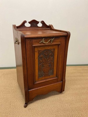 Lot 491 - An oak purdonium with brass handles and metal...