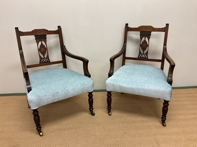 Lot 489 - A pair of Edwardian low chairs with inlay...