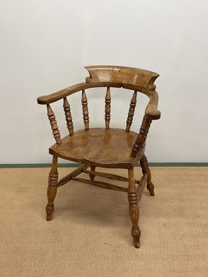 Lot 420 - A fruitwood and ash open armchair.