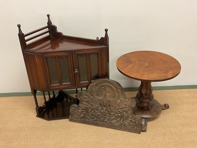 Lot 506 - A small pedestal table, a carved oak peacock...