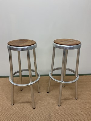 Lot 473 - A pair of 1980's aluminium and teak bar stools,...
