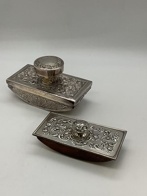 Lot 1107 - Two white metal mounted ink blotters with...