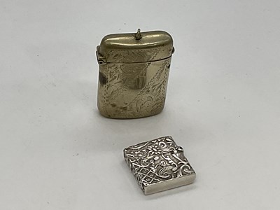 Lot 1135 - A miniature silver stamp box modelled as a...