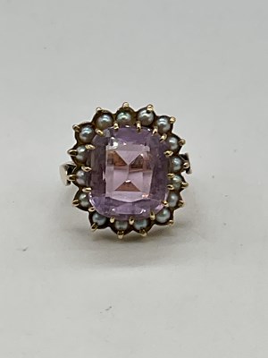 Lot 1193 - A 9ct yellow gold seed pearl and pale amethyst...