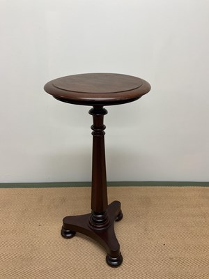 Lot 493 - A Victorian mahogany tripod side table raised...