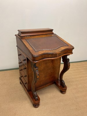 Lot 445 - A reproduction burr walnut Davenport with...