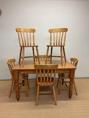 Lot 471 - A pine kitchen table, height 77cm, width 138cm,...