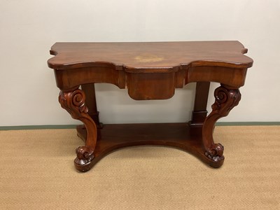 Lot 524 - A mahogany shaped serpentine hall console...