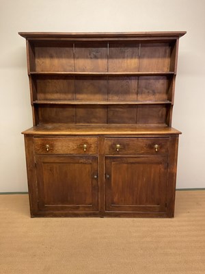 Lot 469 - An early 20th century oak dresser with...