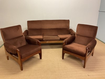 Lot 438 - A 1970s teak framed and upholstered sofa and...