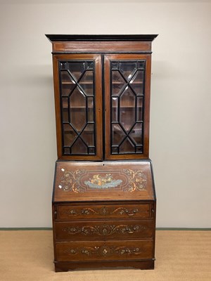 Lot 410 - An Edwardian mahogany brass and pewter inlaid...