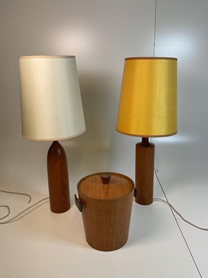Lot 484 - Two mid 20th century teak table lamps and a...