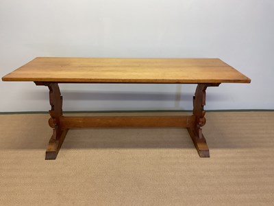 Lot 411 - An oak farmhouse plank top table, height 72cm,...