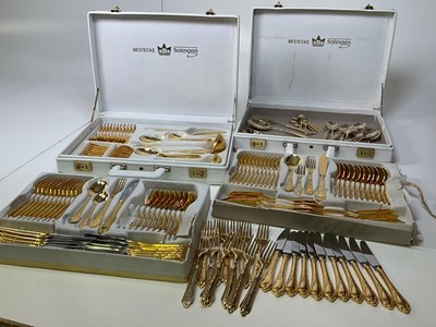 Lot 1006 - Two cases of Solingen gold plated cutlery and...