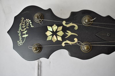 Lot 344 - A Countryman Pro banjo, with soft case.