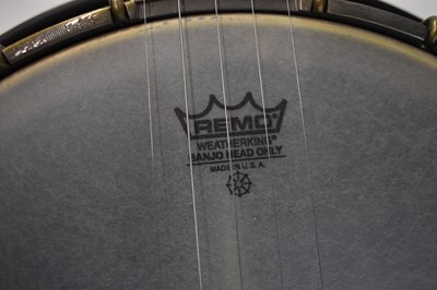Lot 344 - A Countryman Pro banjo, with soft case.