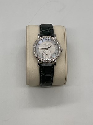 Lot 1320 - PATEK PHILIPPE; a lady's diamond set Calatrava...