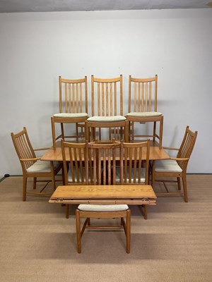 Lot 387 - ERCOL; an elm and beech extending dining table...