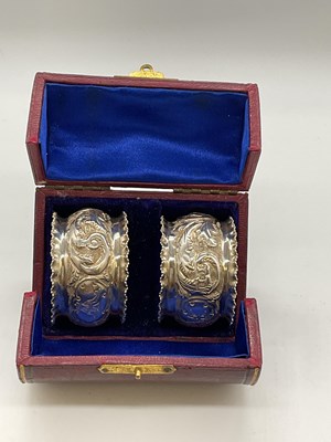 Lot 1112 - A leather cased pair of Victorian hallmarked...