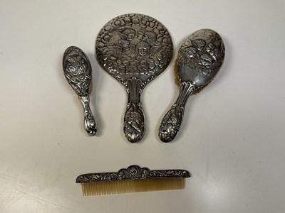 Lot 1105 - A George V hallmarked silver three piece...