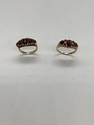 Lot 1220 - Two 9ct yellow gold garnet set rings , size Q...