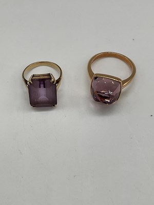 Lot 1265 - A yellow metal dress ring set with pale purple...