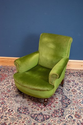 Lot 2506 - An Edwardian green upholstered club armchair.