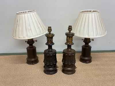 Lot 342 - Two pairs of decorative table lamps, one with...