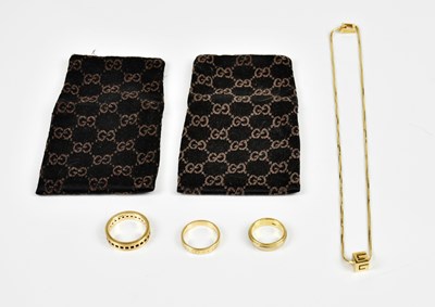 Lot 2169 - GUCCI: a gold plated necklace suspending a...