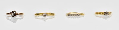 Lot 2174 - An 18ct yellow gold diamond set solitaire ring,...