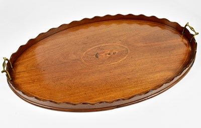 Lot 1021 - A Victorian inlaid mahogany twin handled tray...