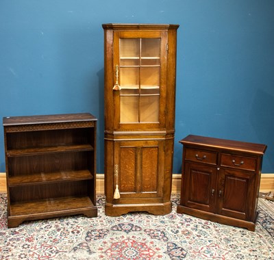 Lot 2593 - A reproduction oak free standing corner...