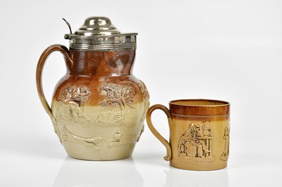 Lot 1486 - A 19th century salt glazed jug with hallmarked...