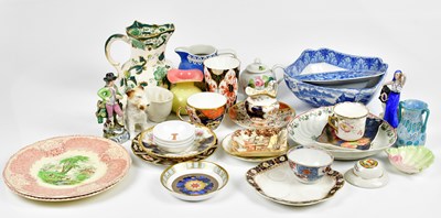 Lot 1488 - An assortment of ceramics to include a 19th...