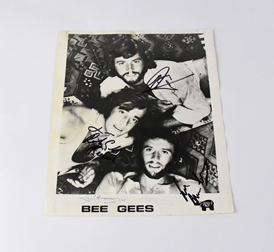 Lot 186 - THE BEE GEES; a black and white promotional...