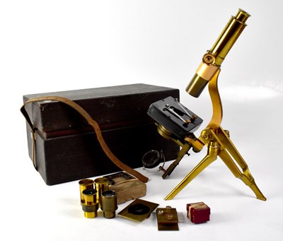 Lot 188 - A brass and lacquered monocular microscope