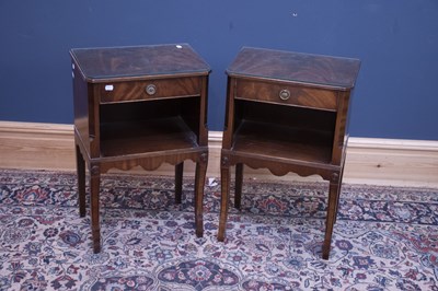 Lot 2595 - A pair of reproduction single drawer bedside...