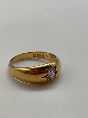 Lot 1200 - An 18ct yellow gold and diamond 'gypsy ring',...