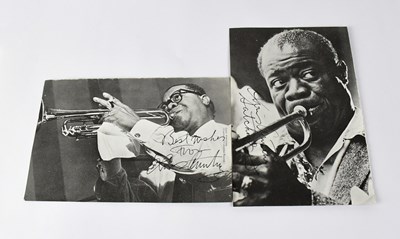 Lot 155 - LOUIS ARMSTRONG; two black and white pages...