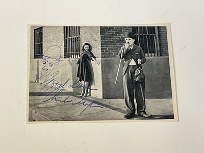 Lot 2311 - CHARLIE CHAPLIN; a black and white magazine...